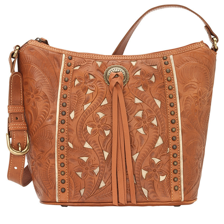 Hill Country bucket tote in natural tan with hand tooled leather accents and bolo concho with tassel