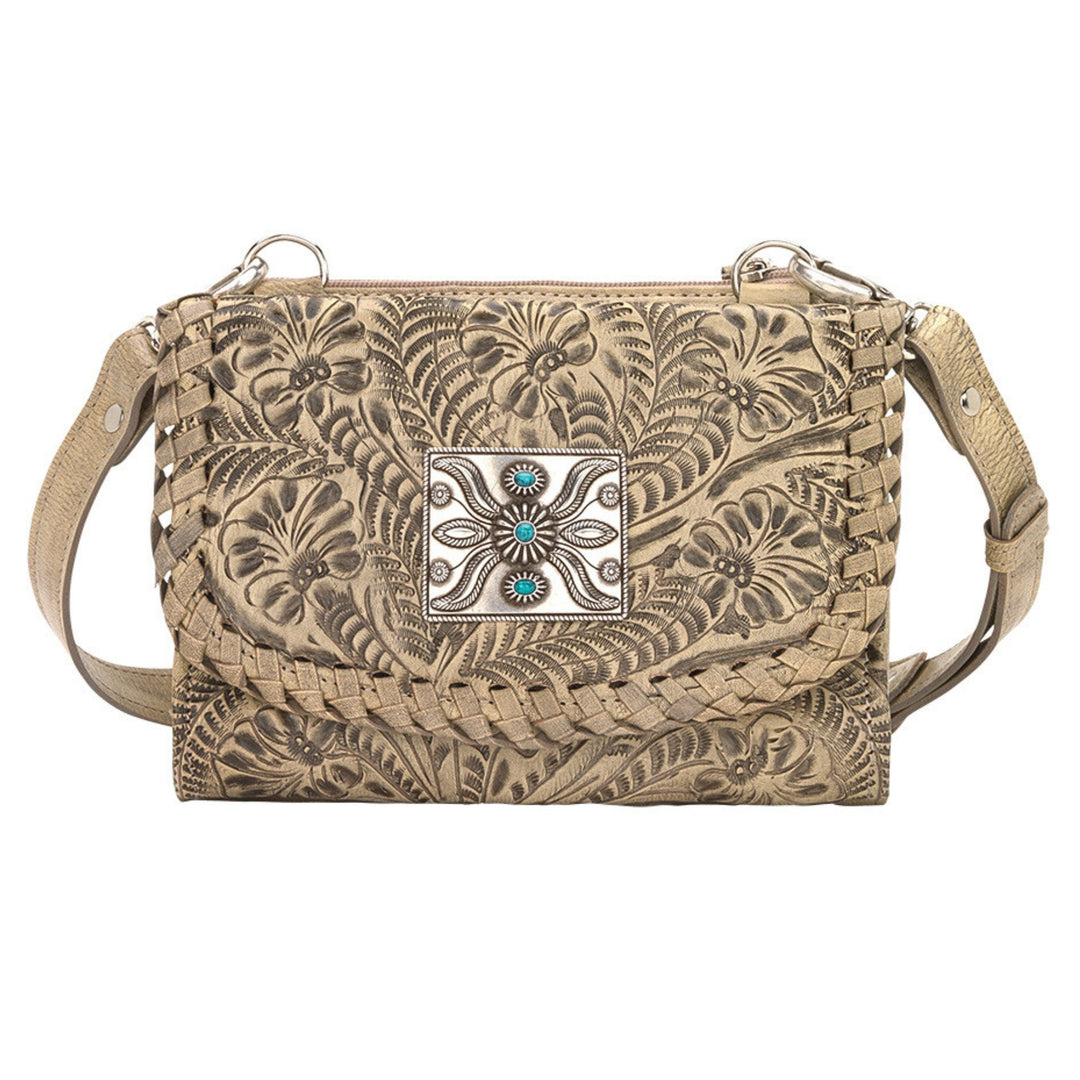 Mohave Canyon crossbody bag in sand with hand tooled leather pattern and concho