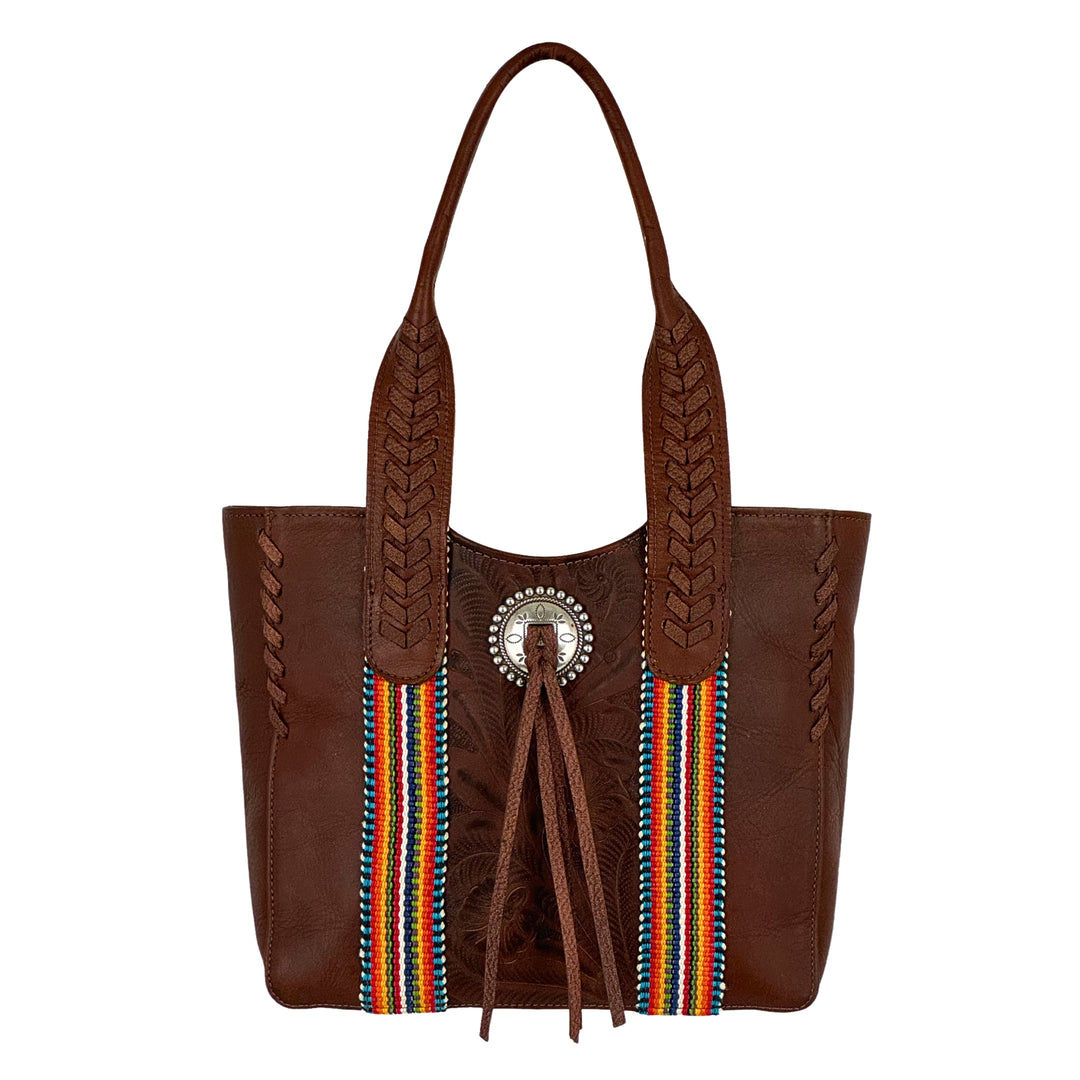Maká Festive tote in brown with hand tooled leather, red themed hand woven tapestry, and bolo concho with tassle