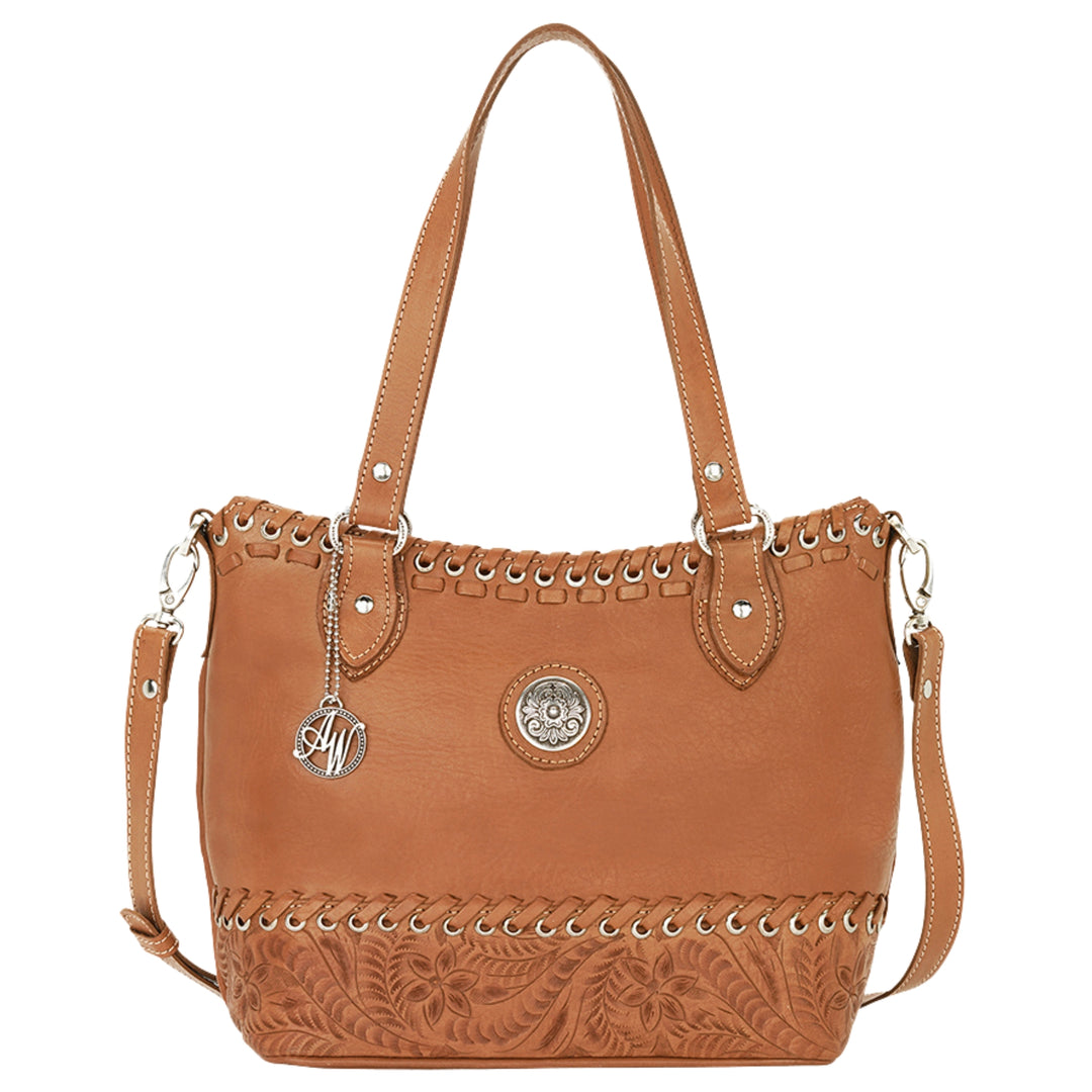 Harvest Moon convertible bucket tote in natural tan with hand tooled leather accents