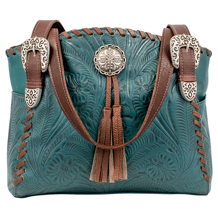 Lariats and Lace multi-compartment conceal carry tote in dark turquoise with hand tooled leather, concho and tassel accents