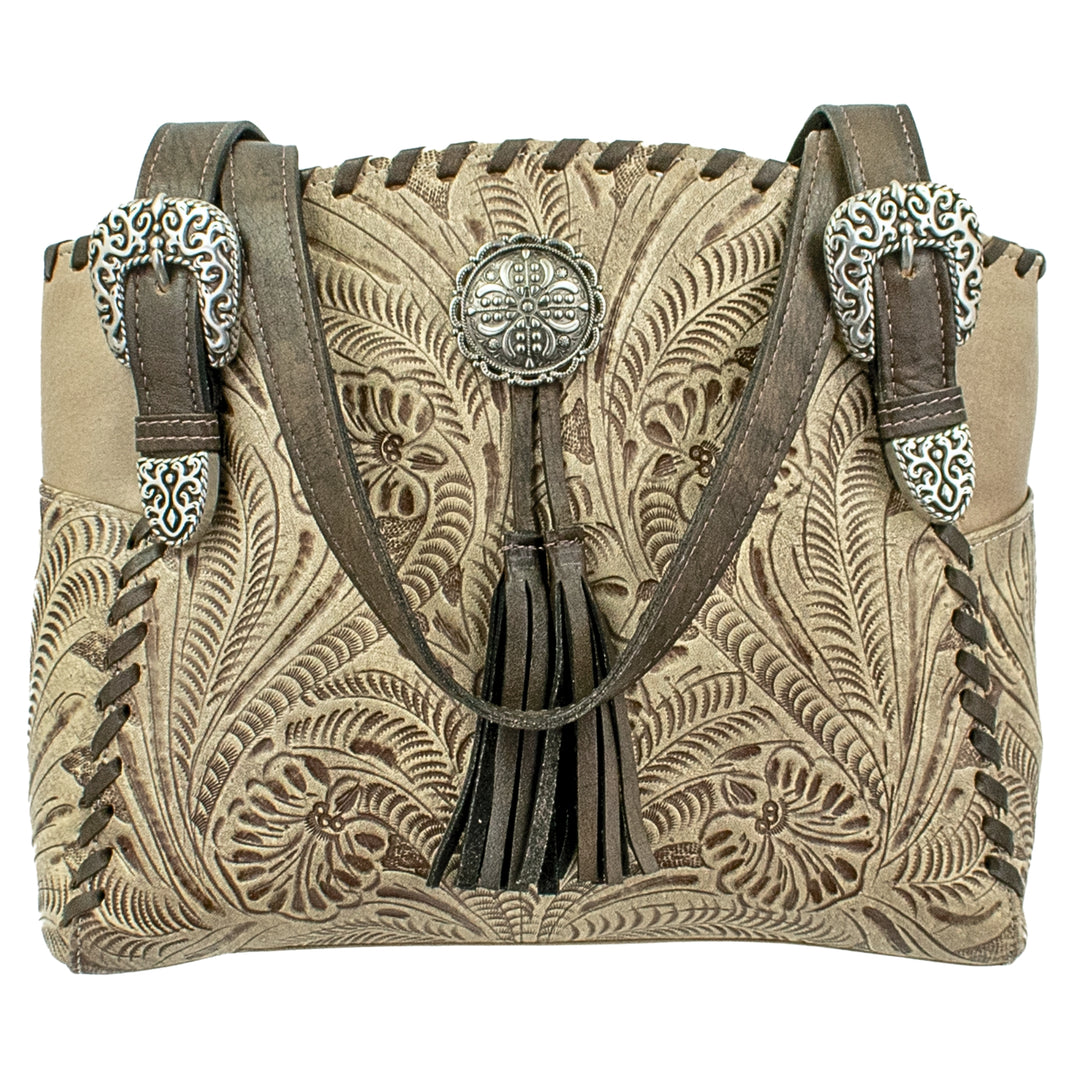 Lariats and Lace multi-compartment conceal carry tote in sand with hand tooled leather, concho and tassel accents
