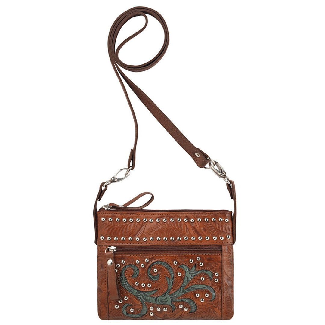 Prairie Sage crossbody/hip bag in medium brown with hand tooled leather pattern and horse head