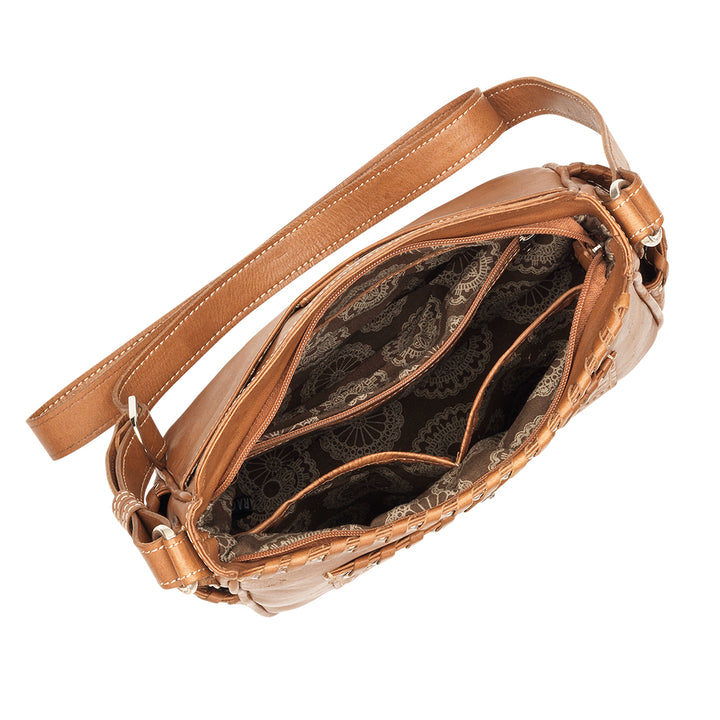Inside view of Inlay Eagle crossbody bag with one zippered and two slip pockets