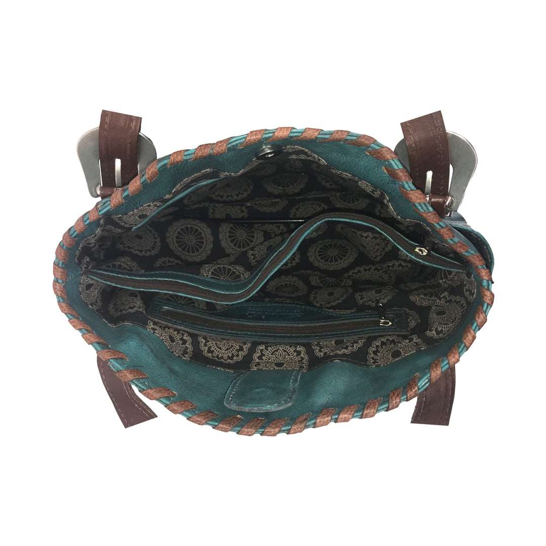 Inside view of Lariats and Lace multi-compartment conceal carry tote with a zippered divider one zippered and two slip pockets 